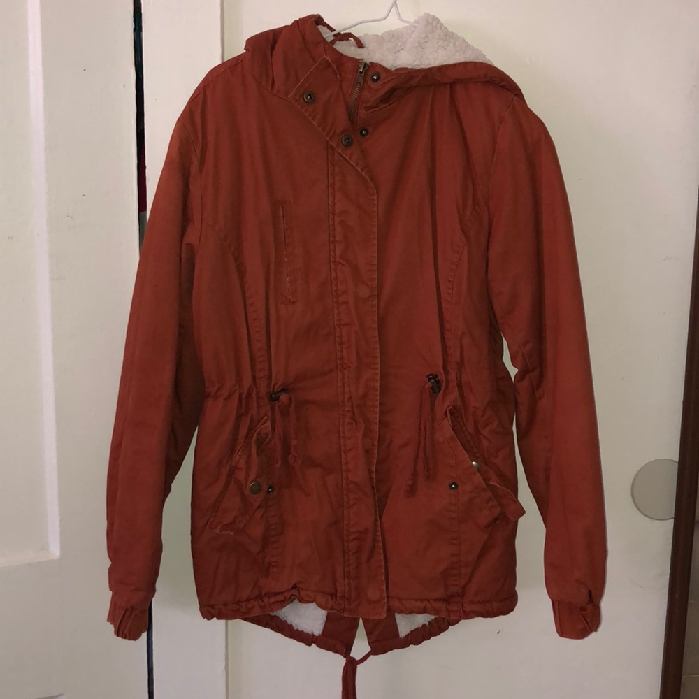 I am selling a rust colored coat w/ many amenities